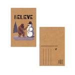 Load image into Gallery viewer, Bigfoot Believe Snowman Christmas Brown Kraft Paper Postcard
